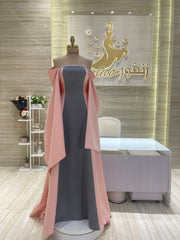 A classic black, sleeveless cocktail dress with a simple silhouette, ideal for a formal occasion.